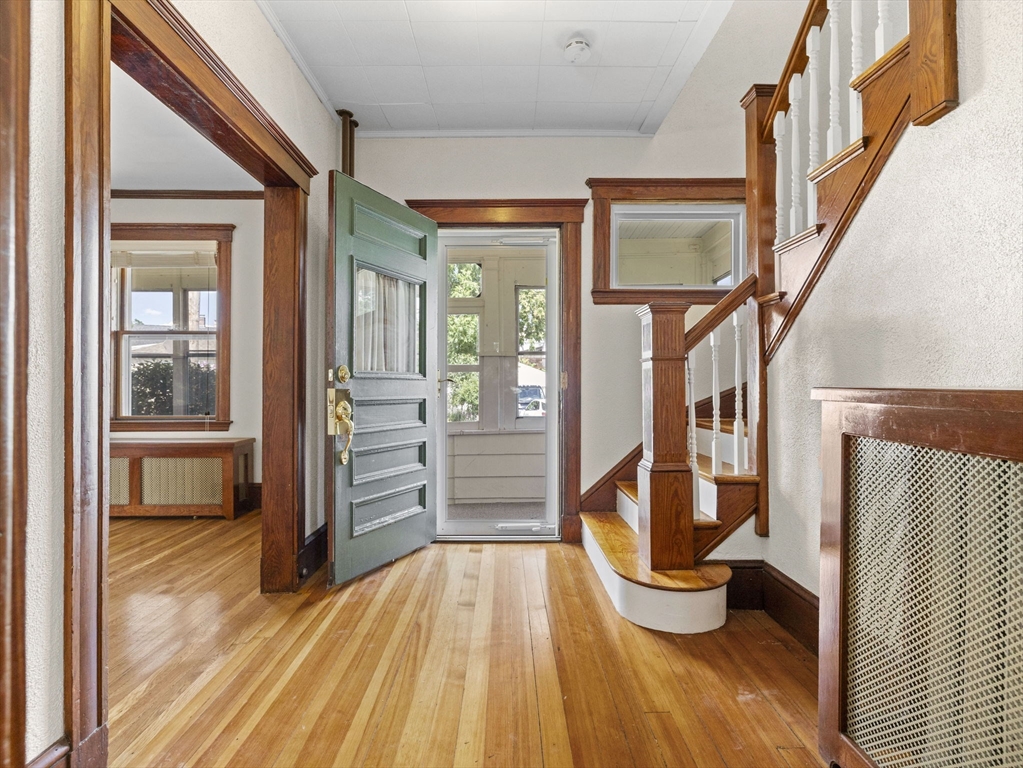 47 Alleyne Street Boston, MA 02132 - Photo 20 of 30 a view of an entryway with wooden floor and windows