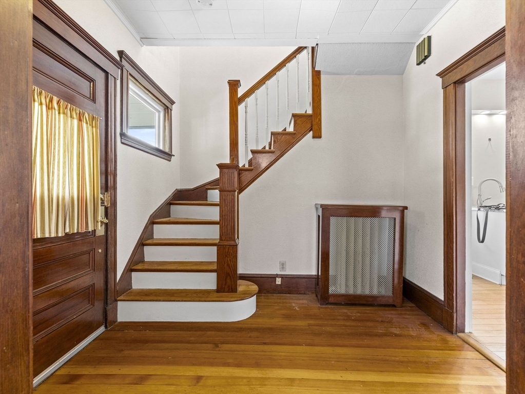 47 Alleyne Street Boston, MA 02132 - Photo 21 of 30 a view of entryway and hall with wooden floor