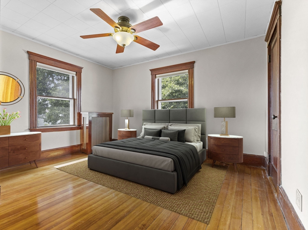 47 Alleyne Street Boston, MA 02132 - Photo 22 of 30 a spacious bedroom with a bed and window
