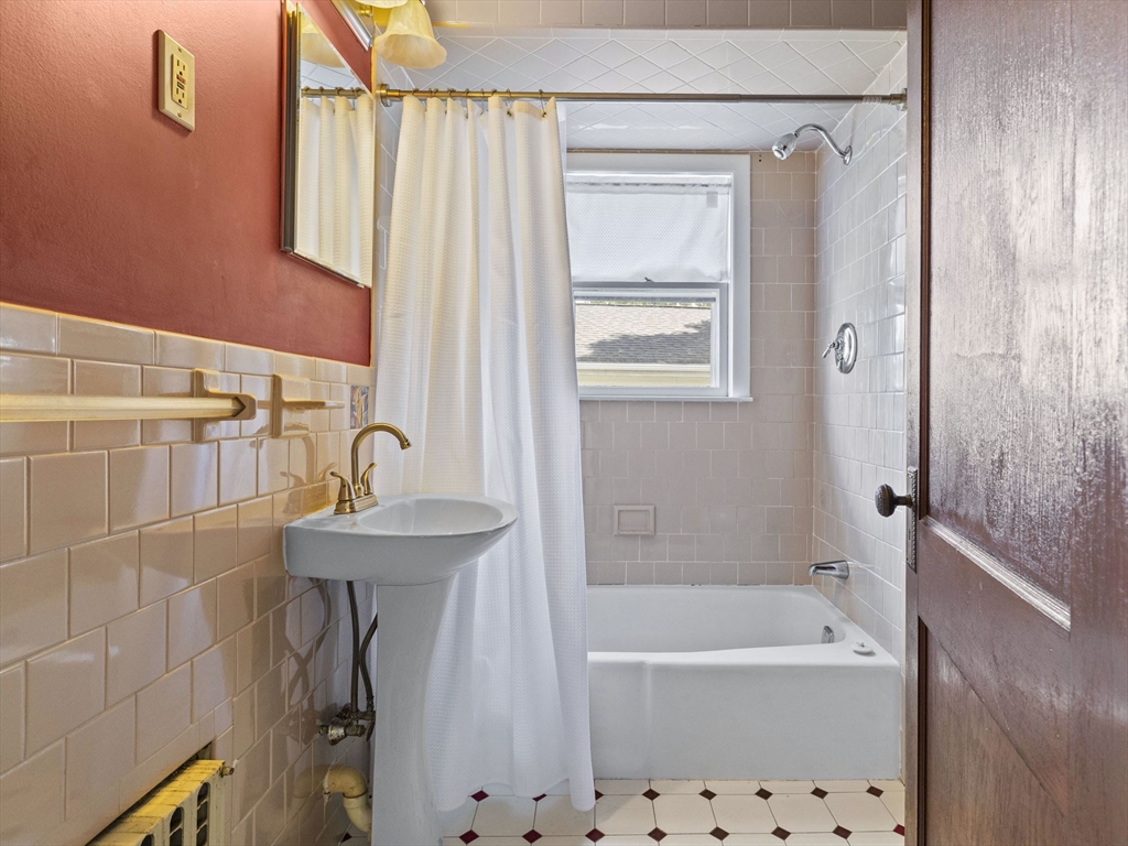 47 Alleyne Street Boston, MA 02132 - Photo 27 of 30 a bathroom with a sink a toilet and shower
