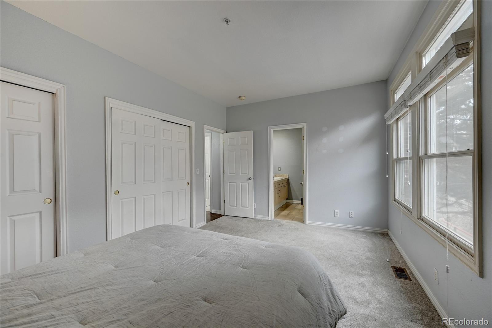 45 Jackson Street, Unit D Denver, CO 80206 - Photo 15 of 26 a view of an empty room with a window