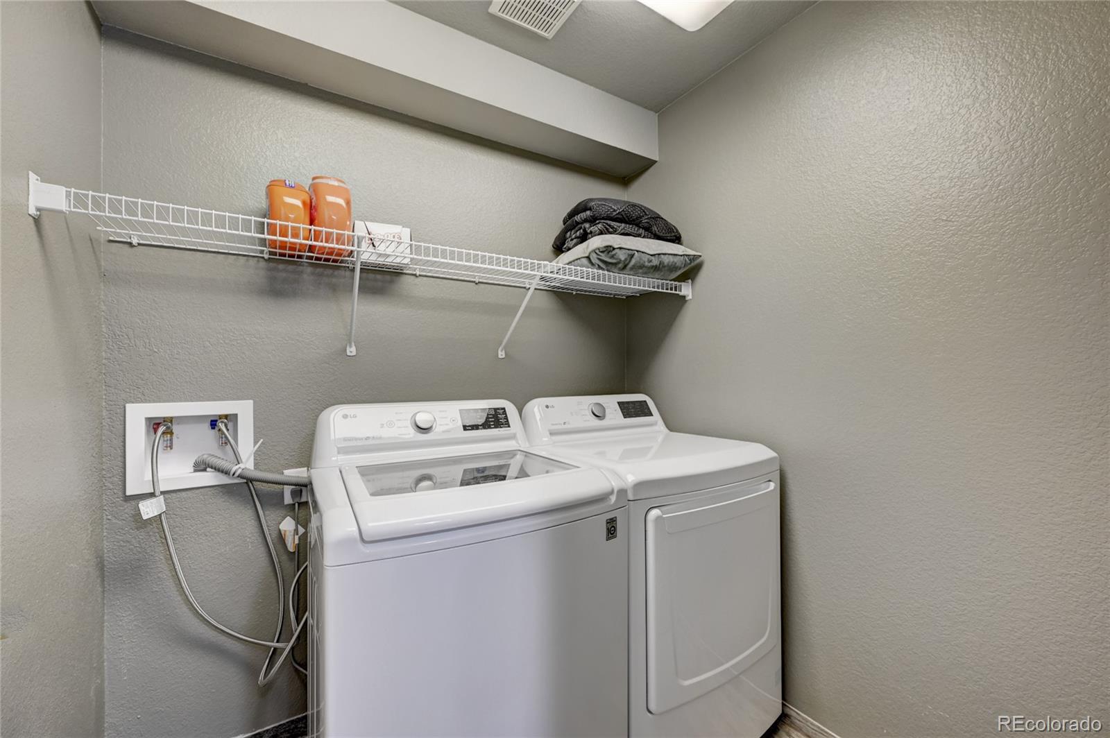 45 Jackson Street, Unit D Denver, CO 80206 - Photo 22 of 26 a utility room with dryer and washer