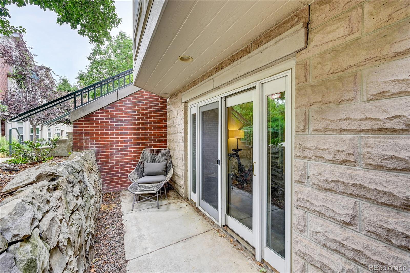 45 Jackson Street, Unit D Denver, CO 80206 - Photo 24 of 26 a backyard of a house with seating space