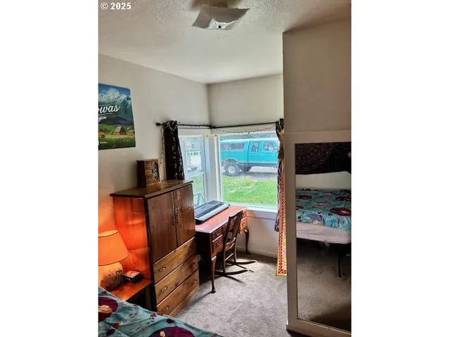 a room with furniture and wooden door