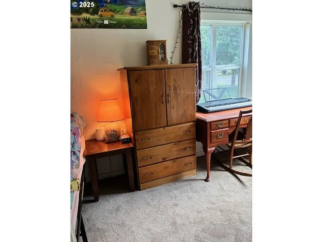 a spacious bedroom with a bed and a closet