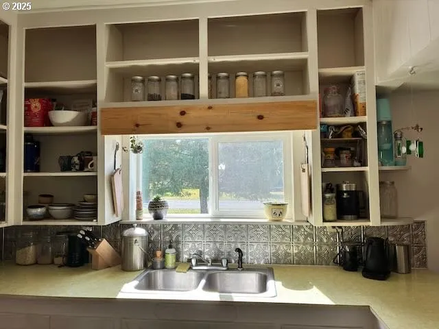 a view of a living room with furniture and wooden floor