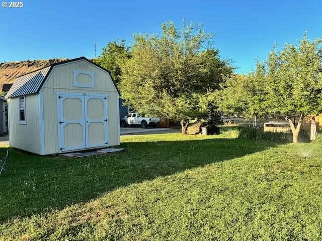 a house view with a garden space
