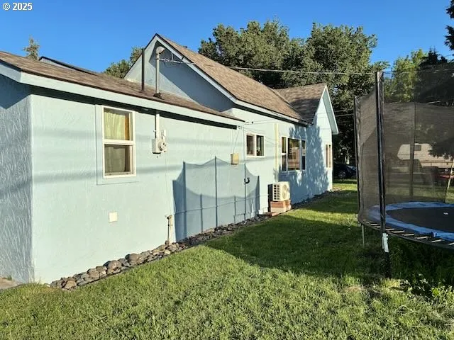 a garden view with a fountain