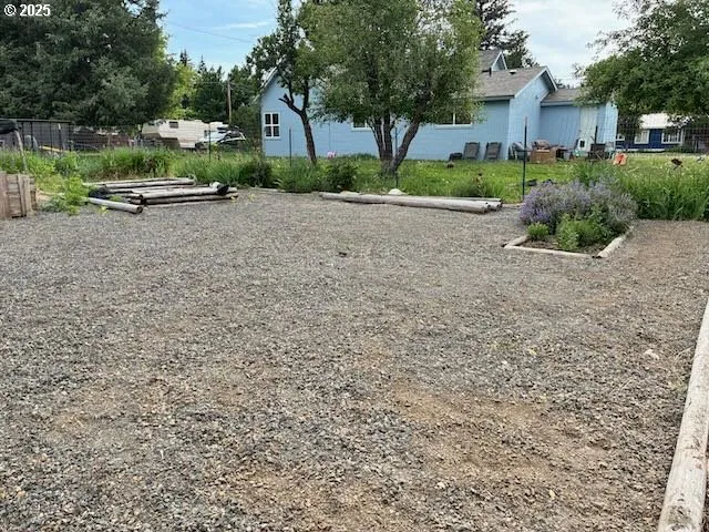 a view of a golf course with a lake