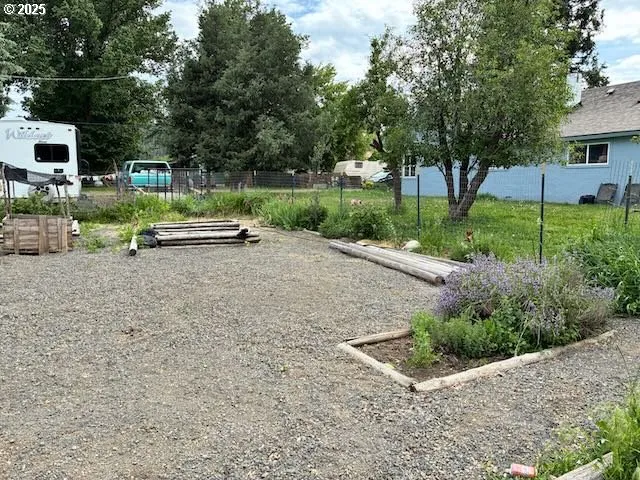 a view of house with outdoor space