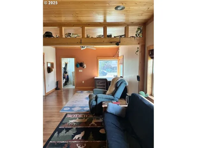 a room with a bed and a window