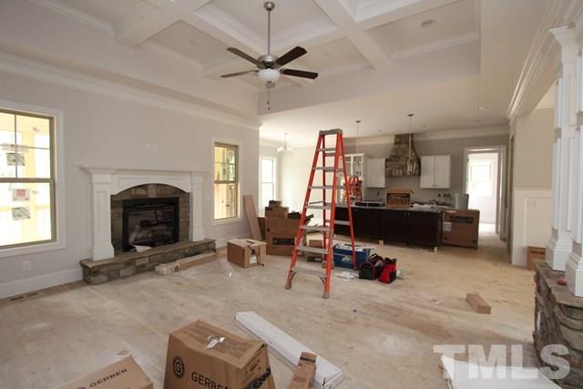 13804 Durant Road Raleigh, NC 27614 - Photo 2 of 25 a living room with furniture and a fireplace