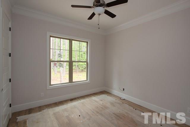 13804 Durant Road Raleigh, NC 27614 - Photo 13 of 25 a view of empty room with ceiling fan
