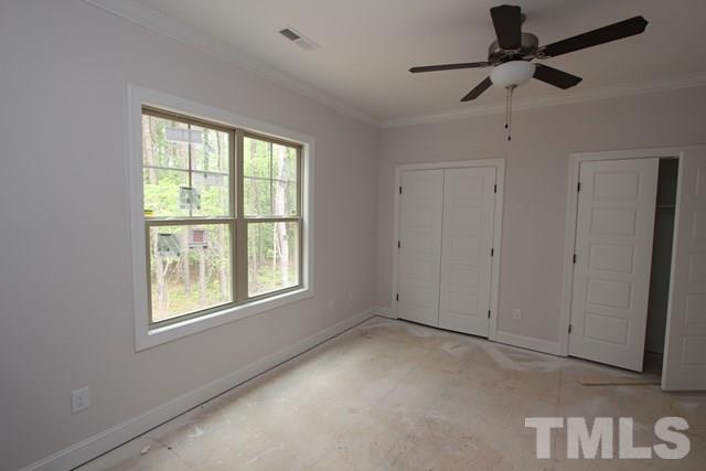 13804 Durant Road Raleigh, NC 27614 - Photo 15 of 25 a view of an empty room with a window