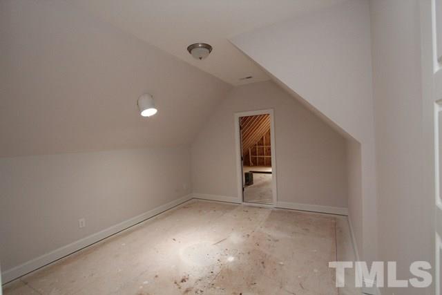 13804 Durant Road Raleigh, NC 27614 - Photo 17 of 25 a view of an empty room with a window