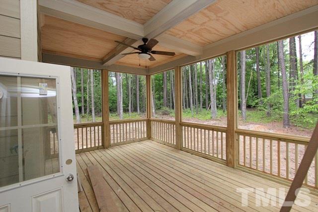 13804 Durant Road Raleigh, NC 27614 - Photo 21 of 25 a view of a porch with wooden floor