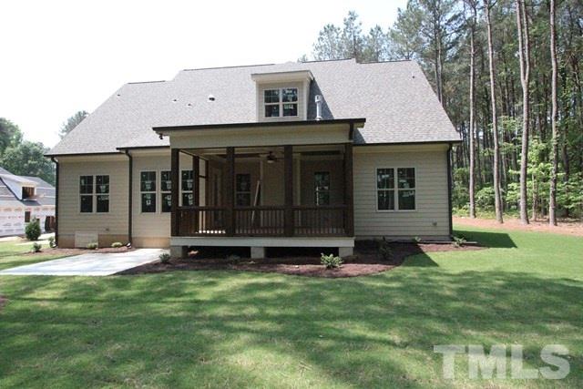 13804 Durant Road Raleigh, NC 27614 - Photo 24 of 25 a view of a house with a yard and sitting area
