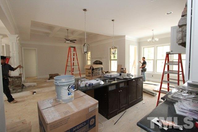 13804 Durant Road Raleigh, NC 27614 - Photo 5 of 25 a very nice looking dining room with a table and chairs