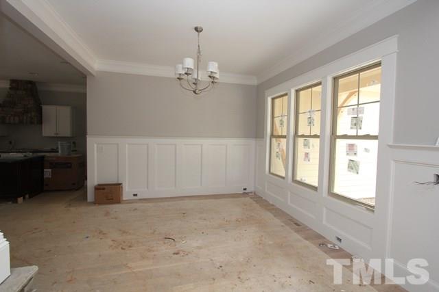 13804 Durant Road Raleigh, NC 27614 - Photo 7 of 25 a view of an empty room with a window