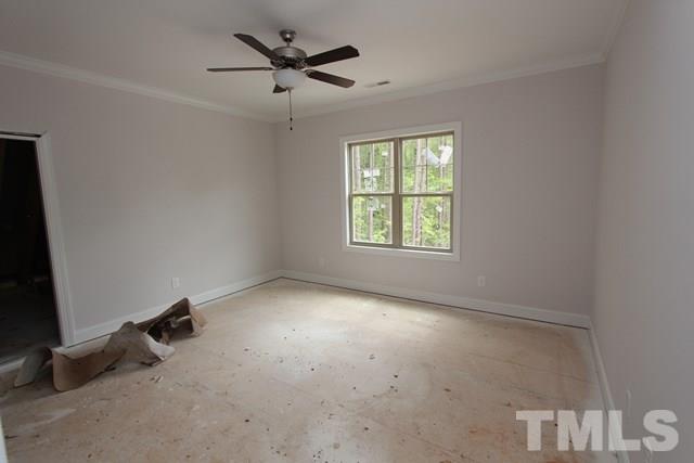 13804 Durant Road Raleigh, NC 27614 - Photo 9 of 25 an empty room with a window