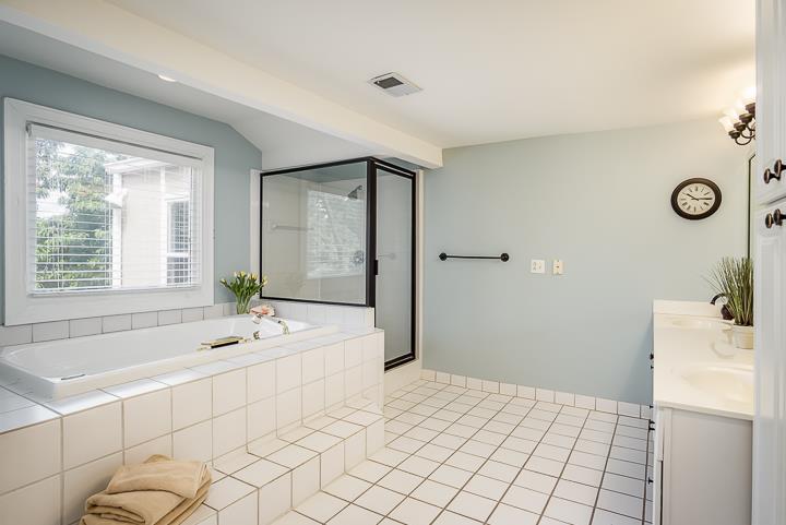 237 Cherokee Road Nashville, TN 37205 - Photo 20 of 30 a bathroom with a tub sink and mirror