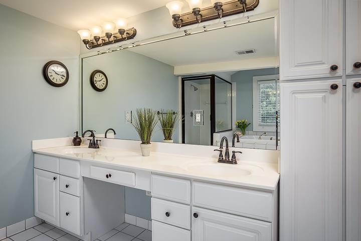 237 Cherokee Road Nashville, TN 37205 - Photo 21 of 30 a bathroom with a sink and a mirror