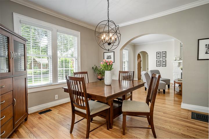 237 Cherokee Road Nashville, TN 37205 - Photo 10 of 30 a view of a dining room with furniture window and wooden floor