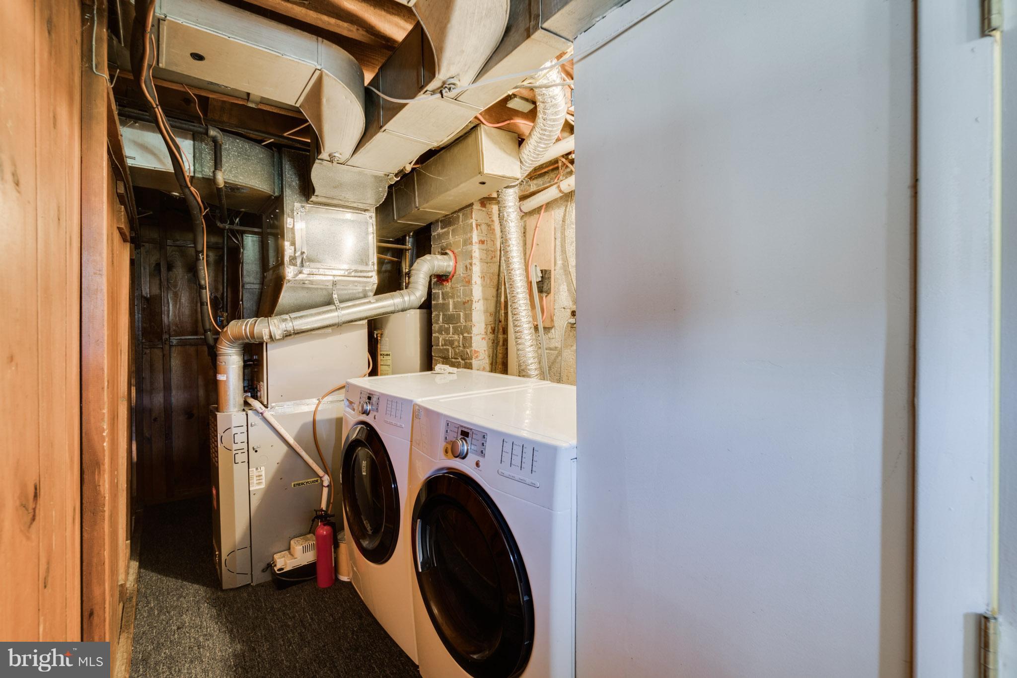 1911 D Street Northeast Washington, DC 20002 - Photo 23 of 25 a utility room with dryer and washer