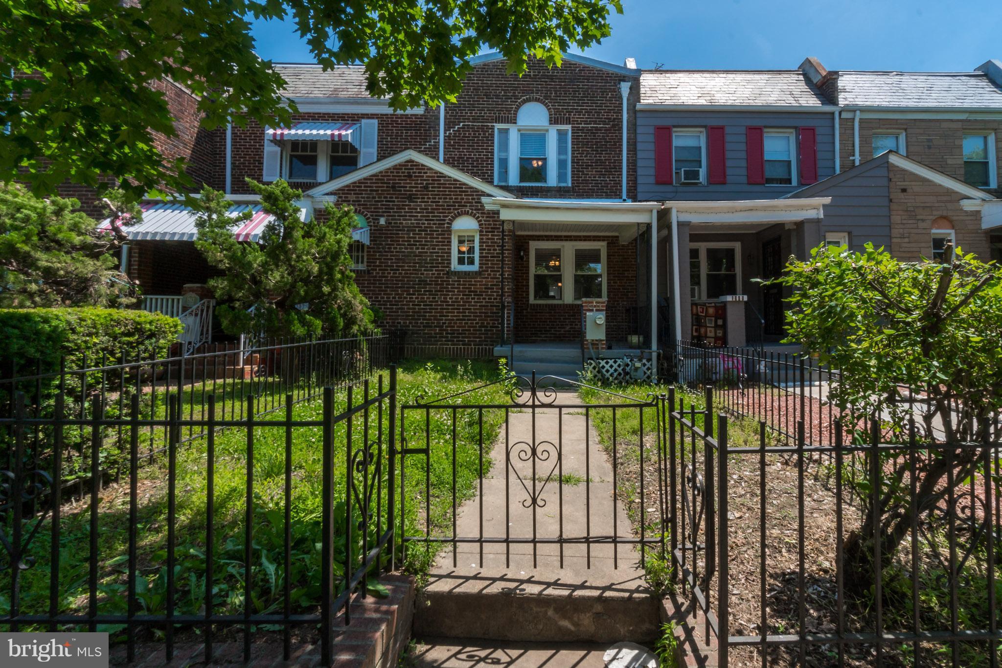 1911 D Street Northeast Washington, DC 20002 - Photo 5 of 25 a front view of house and yard with green space