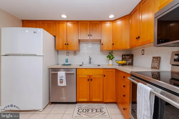 a view of a livingroom with a kitchen