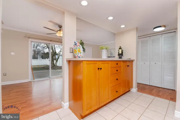 a kitchen with stainless steel appliances a stove a sink and a microwave