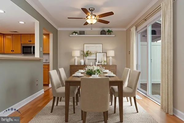 a kitchen with stainless steel appliances a refrigerator sink and cabinets