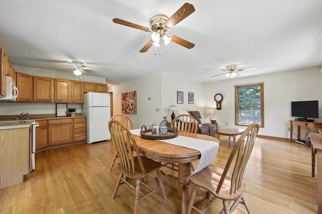 285 Lower Hampden Road Monson, MA 01057 - Photo 20 of 40 a view of a dining room with furniture and wooden floor