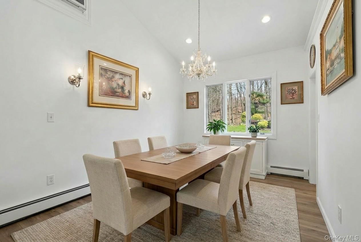 449 West Mombasha Road Monroe, NY 10950 - Photo 6 of 39 a view of a dining room with furniture window and wooden floor