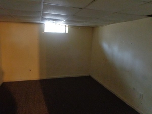 34 Mark Street Springfield, MA 01129 - Photo 15 of 15 a view of an empty room with a window