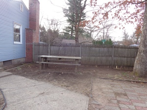 34 Mark Street Springfield, MA 01129 - Photo 3 of 15 a view of backyard with green space