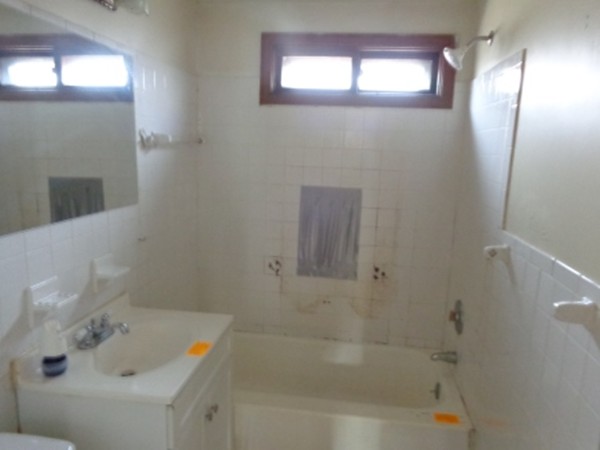 34 Mark Street Springfield, MA 01129 - Photo 9 of 15 a bathroom with a sink and shower