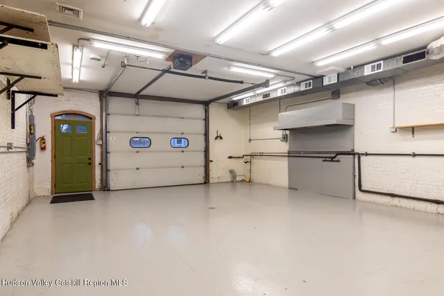 a white toilet sitting next to a shower curtain