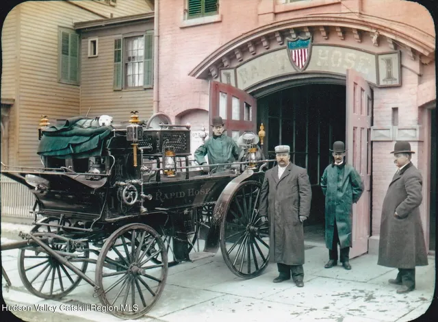 a view of a hallway with a painting on the wall