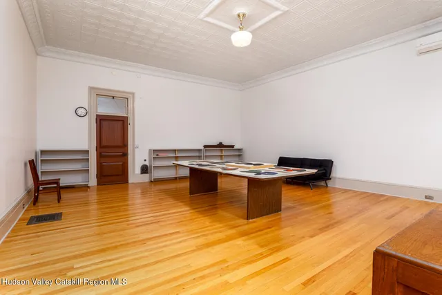 a view of kitchen with table and chair