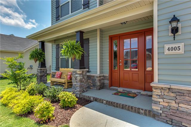 4005 Fox Run North Spring Hill, TN 37174 - Photo 2 of 20 Craftsman style front porch with beautiful stacked stone. Great place to sit and visit with the neighbors!