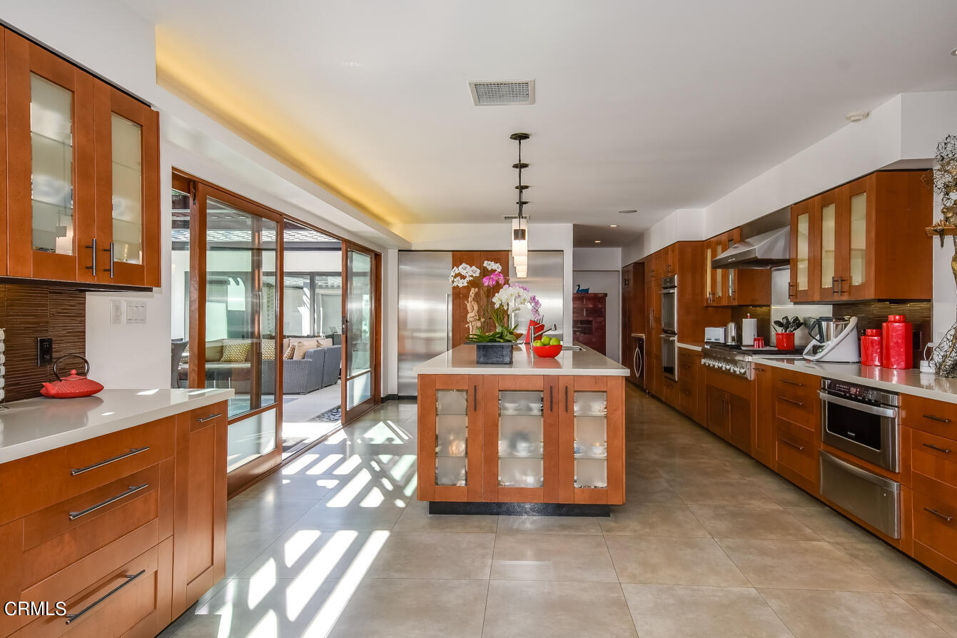 2174 Midlothian Drive Altadena, CA 91001 - Photo 11 of 54 a living room with furniture and a window