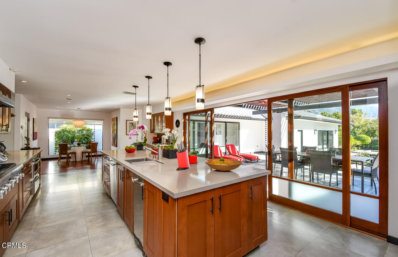 2174 Midlothian Drive Altadena, CA 91001 - Photo 12 of 54 a view of a kitchen island kitchen island furniture and a chandelier