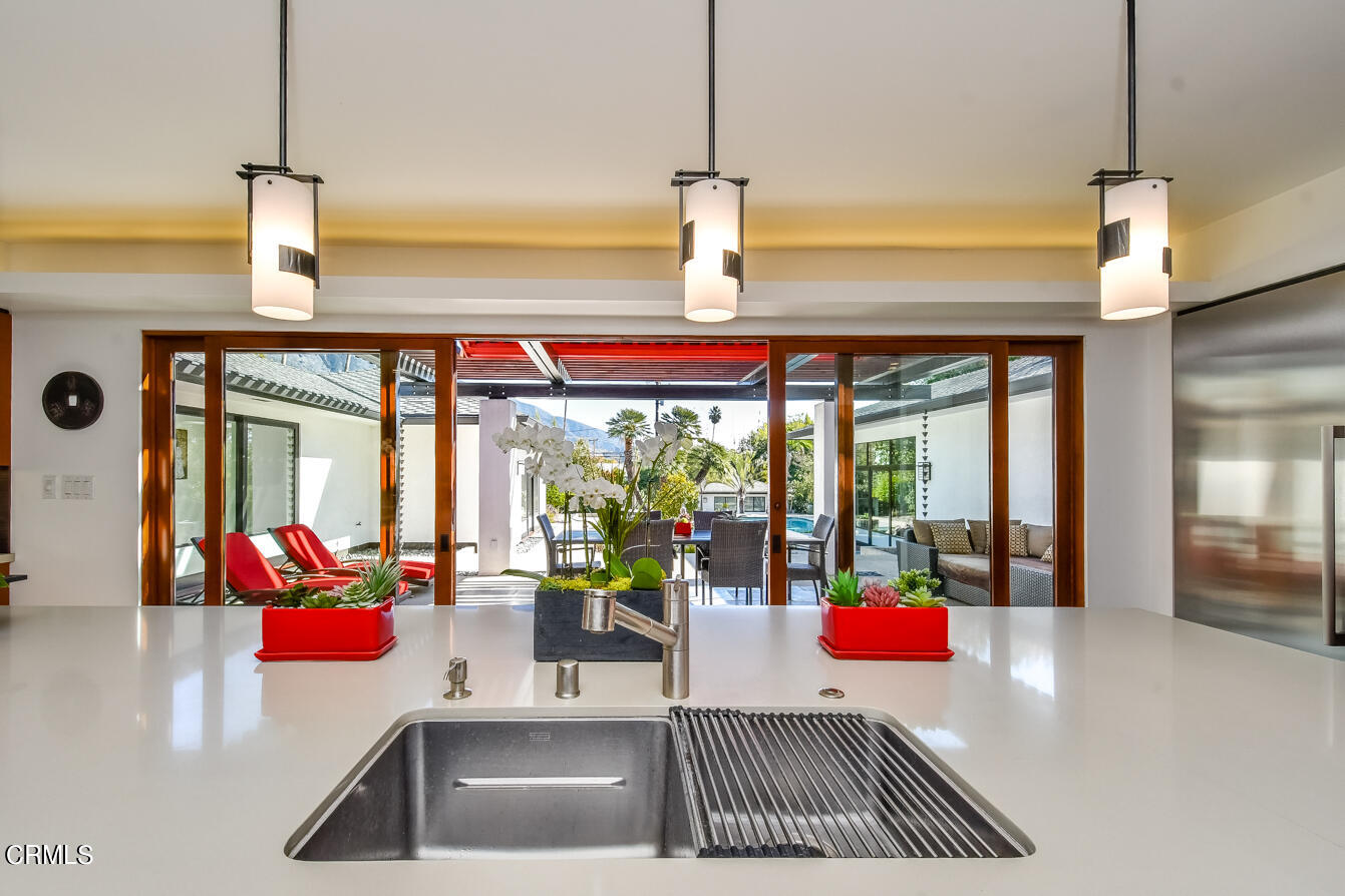 2174 Midlothian Drive Altadena, CA 91001 - Photo 15 of 54 a room with lots of table and a large window