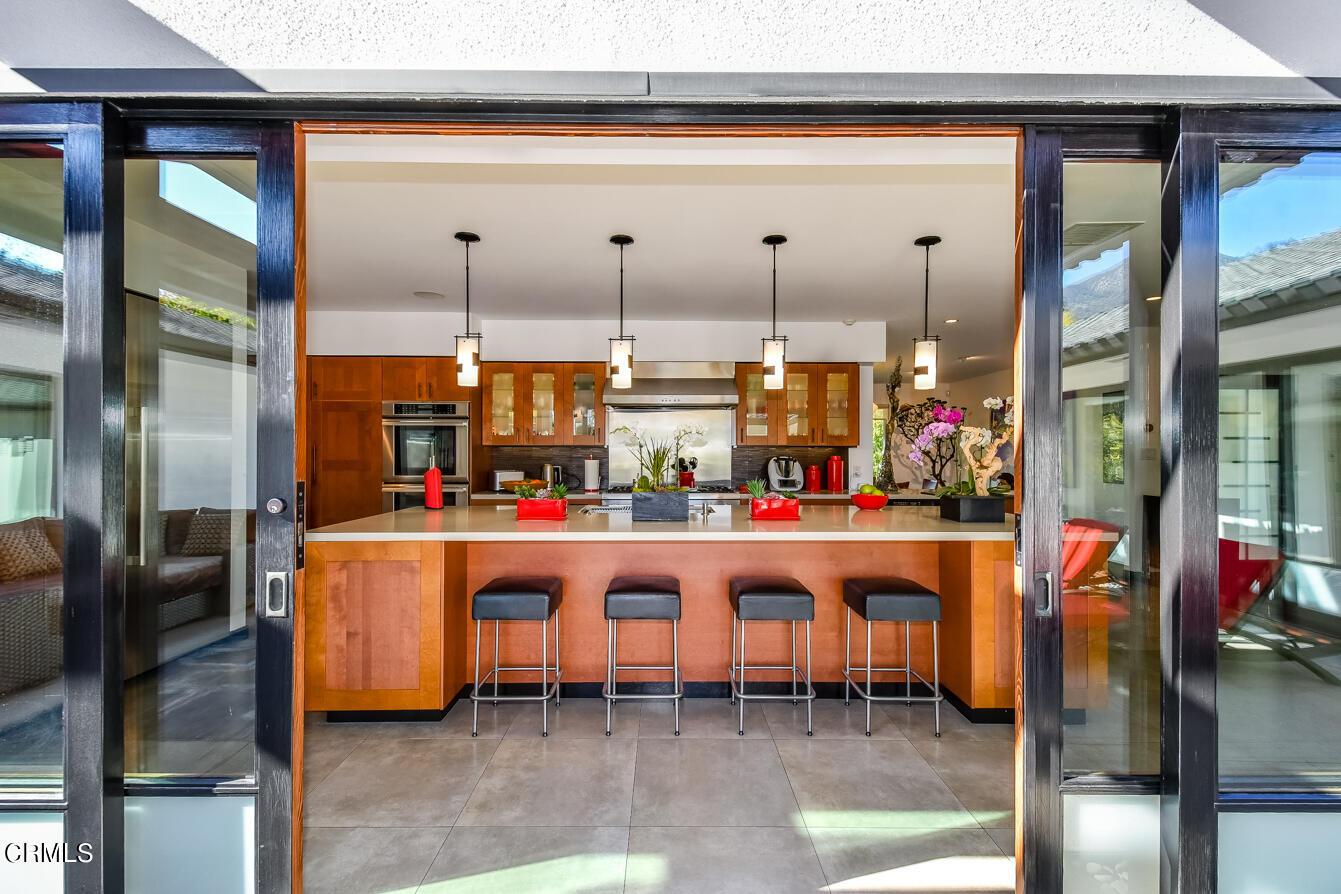 2174 Midlothian Drive Altadena, CA 91001 - Photo 16 of 54 a kitchen with a sink and cabinets