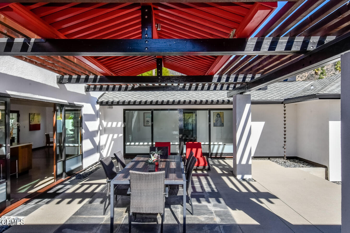 2174 Midlothian Drive Altadena, CA 91001 - Photo 17 of 54 a view of a dining room with furniture window and outside view