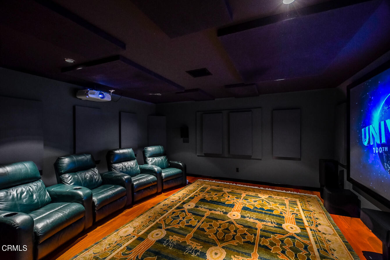 2174 Midlothian Drive Altadena, CA 91001 - Photo 23 of 54 a living room with furniture and a flat screen tv