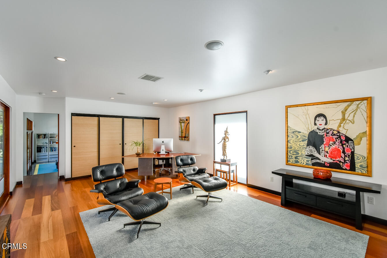 2174 Midlothian Drive Altadena, CA 91001 - Photo 25 of 54 a living room with furniture and a large window