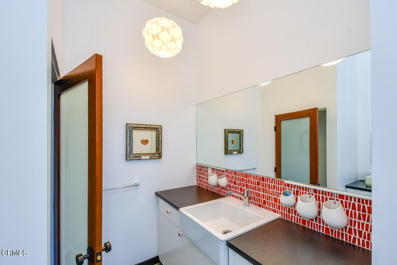 2174 Midlothian Drive Altadena, CA 91001 - Photo 30 of 54 a view of a room that has a bed and a table in it