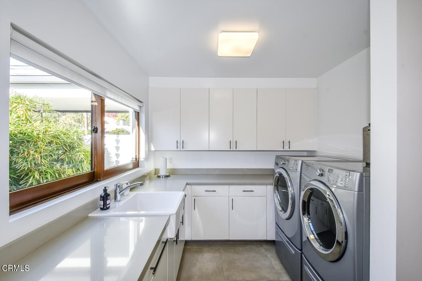 2174 Midlothian Drive Altadena, CA 91001 - Photo 31 of 54 a view of a kitchen with sink washer and dryer